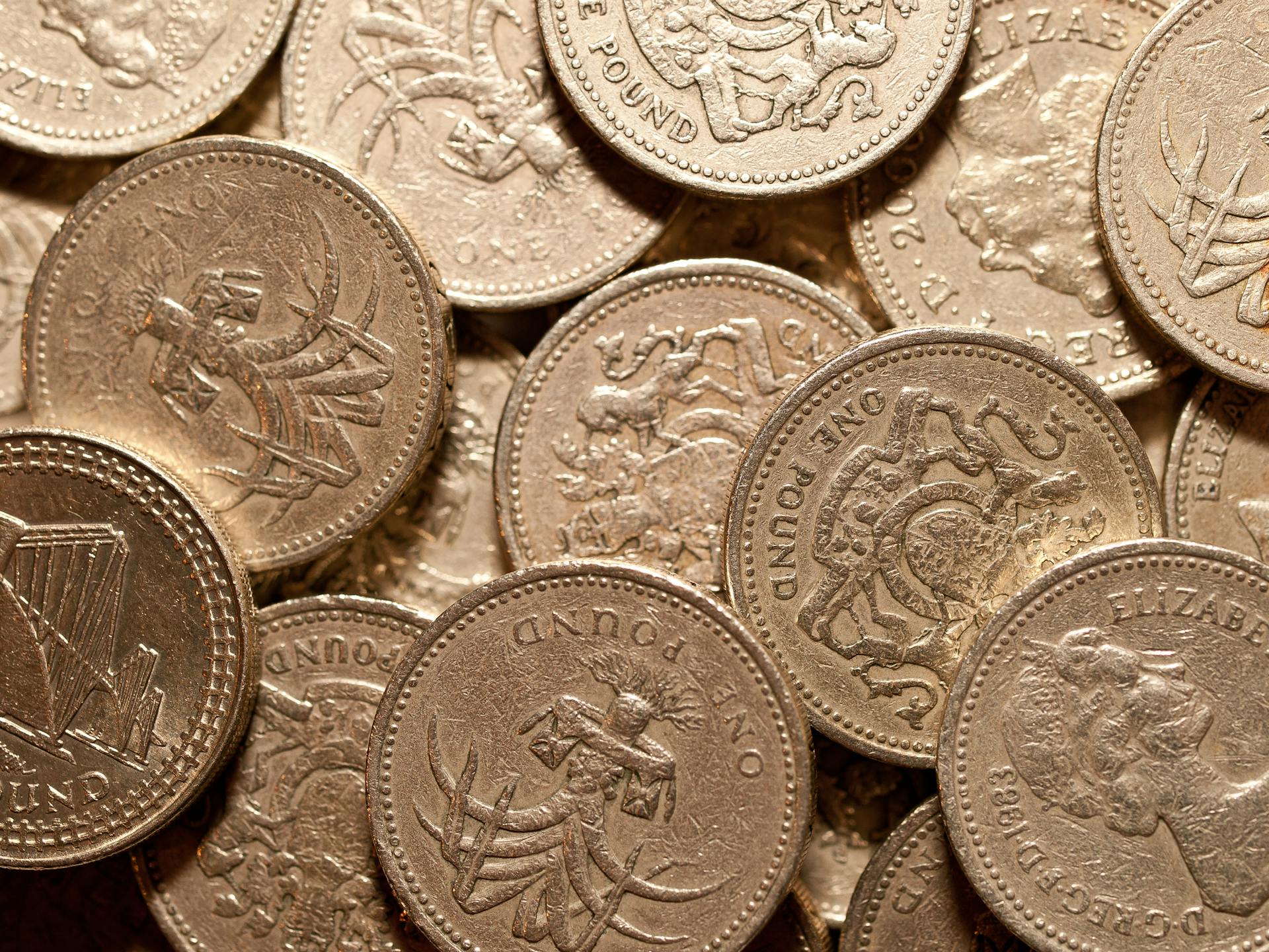 British pound coins — financial and accounting practices in oil and gas E&P